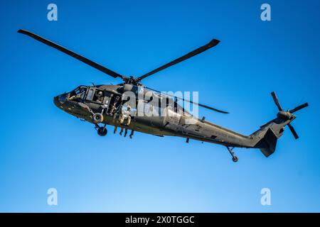 2024 Best Ranger Competition competitors fast rope from a UH-60 ...