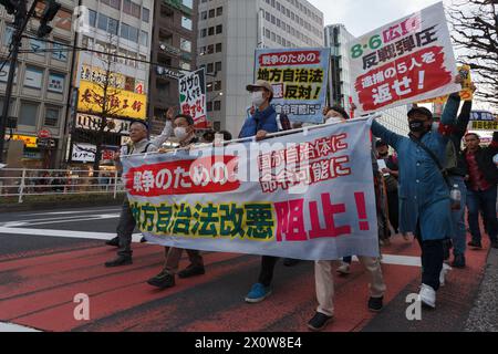 Tokyo, Japan. 13th Apr, 2024. Several hundred people take part in an anti-war protest in the streets of Shinjuku. The protest was organized by left-wing groups and broadly called for an end to the war in Gaza along with anti-government messages concerning the revision of Japan's constitution and the war in Ukraine. Credit: SOPA Images Limited/Alamy Live News Stock Photo