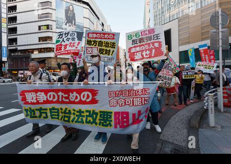 Tokyo, Japan. 13th Apr, 2024. Several hundred people take part in an anti-war protest in the streets of Shinjuku. The protest was organized by left-wing groups and broadly called for an end to the war in Gaza along with anti-government messages concerning the revision of Japan's constitution and the war in Ukraine. Credit: SOPA Images Limited/Alamy Live News Stock Photo