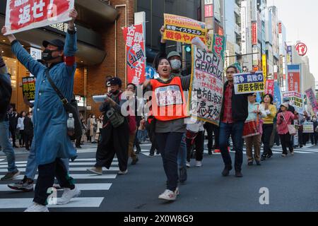 Tokyo, Japan. 13th Apr, 2024. Several hundred people take part in an anti-war protest in the streets of Shinjuku. The protest was organized by left-wing groups and broadly called for an end to the war in Gaza along with anti-government messages concerning the revision of Japan's constitution and the war in Ukraine. Credit: SOPA Images Limited/Alamy Live News Stock Photo