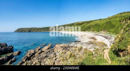 28 May 2023: Vault Beach, Roseland Peninsula, Cornwall, UK. - Panorama of Vault Beach on a sunny day in late spring. Stock Photo