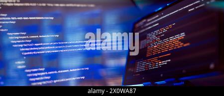 Running Computer data programming. Coding script text on screen. Notebook closeup Stock Photo