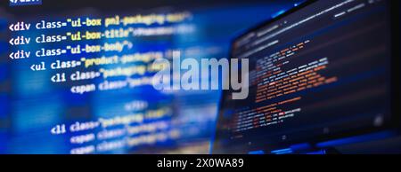 Running Computer data programming. Coding script text on screen. Notebook closeup Stock Photo