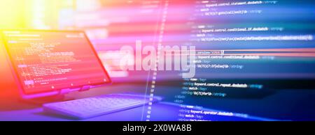 Working atmosphere of a programmer at home, background. Programming code abstract Stock Photo