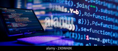 Working atmosphere of a programmer at home, background. Programming code abstract Stock Photo