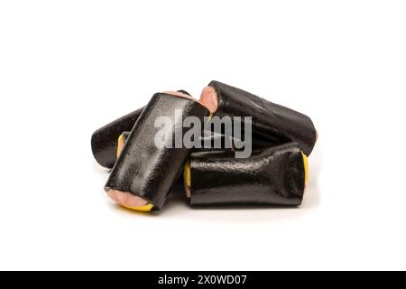 Jelly anise candy isolated on a white background. Black jelly candies. Top view. Delicious gelatin candies. Stock Photo