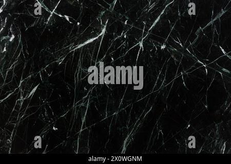 Verias Green Marble background, texture in dark color for your design. Slab photo. Stock Photo