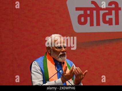 New Delhi, Delhi, India. 14th Apr, 2024. Indian Prime Minister Narendra Modi gestures as he speaks during the release of the Bharatiya Janata Party (BJP) manifesto for the upcoming Indian General Elections at the party headquarters in New Delhi, India on April 14, 2024. (Credit Image: © Kabir Jhangiani/ZUMA Press Wire) EDITORIAL USAGE ONLY! Not for Commercial USAGE! Stock Photo