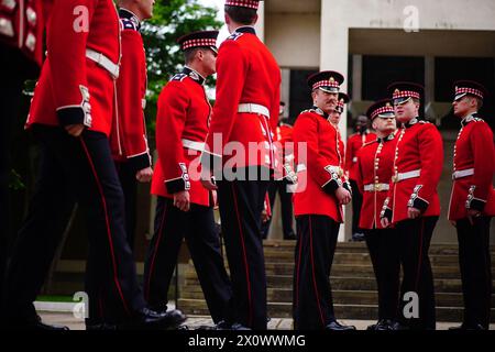 Members of the Scots Guards gather ahead of the Black Sunday Parade, at the chapel of the Guards Museum in Wellington Barracks, Westminster, London. Picture date: Sunday April 14, 2024. Stock Photo