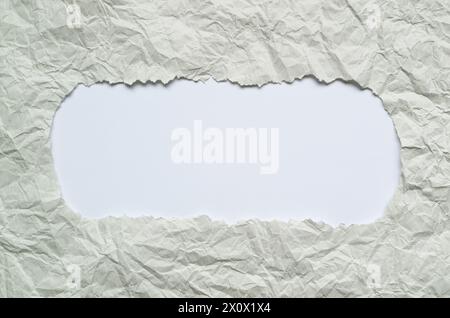 Frame of Ripped White Paper with White Copy Space Stock Photo