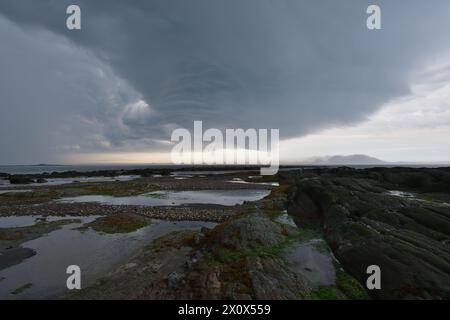 Bad weather on St-Lawrence river Ile aux Lievres. Heavy rain coming our way. Dark clouds. Stock Photo