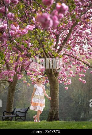 Photograph posed by model. Maja Lawson takes a photograph as she enjoys ...