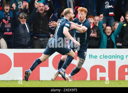 Ross County's Josh Sims (left) celebrates scoring their side's third goal of the game with team-mate during the cinch Premiership match at the Global Energy Stadium, Dingwall. Picture date: Sunday April 14, 2024. Stock Photo