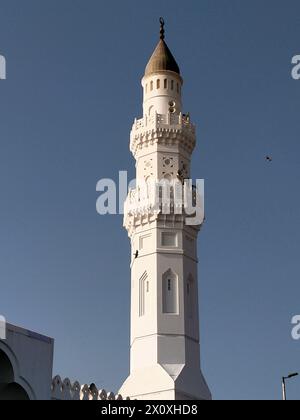 Mosque tower in Medina, Saudi Arabia with blue sky background Stock Photo