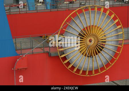 Motorised cable reels of mobile harbour gantry crane close up viewed in container terminal in La Guaira port. Stock Photo