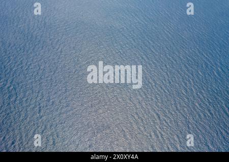 sea and waves, view from above, calm surface, copy space. Stock Photo