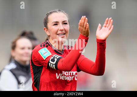 Manchester United's Katie Zelem applauds the fans following the Adobe Women's FA Cup semi-final match at Leigh Sports Village. Picture date: Sunday April 14, 2024. Stock Photo