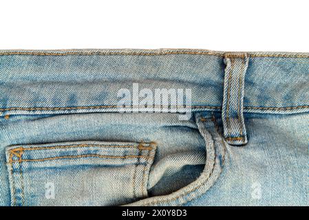 Piece of jeans with a pocket on a white background. Jeans isolate Stock Photo