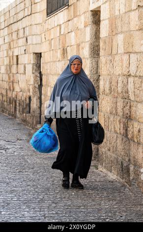 Jerusalem, Israel - September 1, 2023. religious woman in the old city. High quality photo Stock Photo