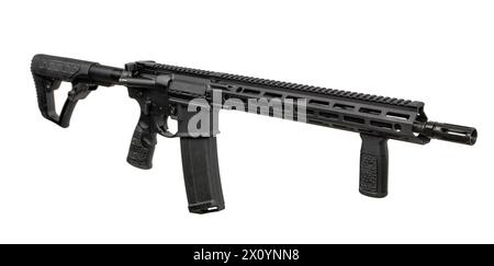 A modern automatic carbine without sights and with an additional handle. Isolate on a white background. Stock Photo