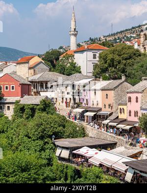 Mostar, Bosnia and Herzegovina, August 13, 2023. Charming Mostar city With Majestic Steeple in the Background Stock Photo