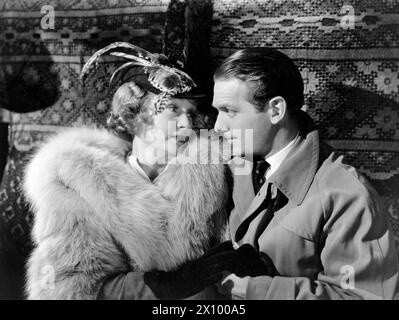 Billie Burke, Douglas Fairbanks, Jr., on-set of the film, 'The Young In Heart', United Artists, 1938 Stock Photo