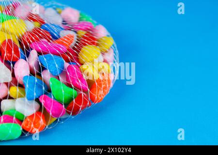 Mesh detail with colorful decorative stones Stock Photo