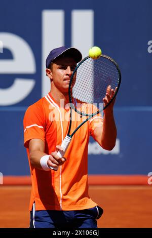 Barcelona, Spain. 14th Apr, 2024. Duje Ajdukovic in action during the Barcelona Open Banc de Sabadell Tennis Tournament at the Reial Club de Tennis Barcelona in Barcelona, Spain. Credit: Christian Bertrand/Alamy Live News Stock Photo