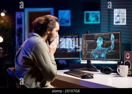 Man unable to believe eyes after seeing AI gaining humanoid form and consciousness, waving hand to salute him. Computer scientist surprised by artificial intelligence greeting him unprompted Stock Photo