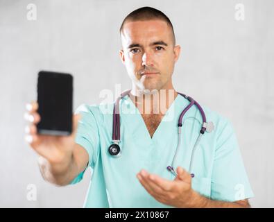 Doctor employs modern communication Stock Photo
