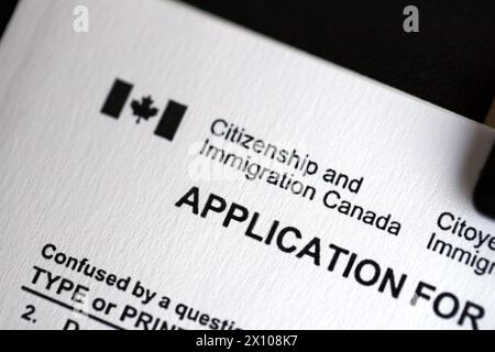 Citizenship and Immigration Canada inscription and small canadian flag close up Stock Photo