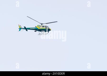 An American Eurocopter AS350B2 helicopter operated by the Los Angeles County Sheriff's Department flies overhead Stock Photo