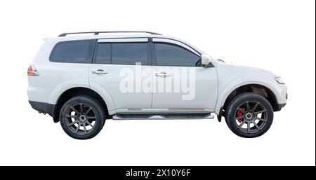 Side view of single white SUV car is isolated on white background with clipping path. Stock Photo