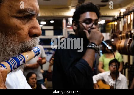 Kolkata, India. 14th Apr, 2024. Several new Bengali musical band have been emerging this year. A new revolution can be seen in Bengali band music based on changing the taste music in young generation has been emerging. A new Bengali psycodelic bule based band names 'The Mahanagar' releases its first song in local music instrument store. Pradip Chatterjee (Bulada), a member of 'Mohiner Ghoraguli' (One of the oldest music band based in Kolkata) also present in this event. (Photo by Swattik Jana/Pacific Press) Credit: Pacific Press Media Production Corp./Alamy Live News Stock Photo