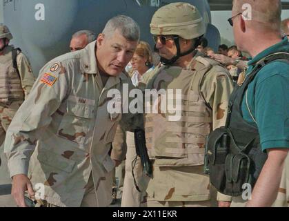 Brig. Gen. Carter Ham, right, Multi-national Brigade - North commander greets Gen. George Casey, vice chief of staff of the Army in Mosul, Iraq. Senior U.S. military officials visited Mosul to meet with local leaders prior to the transfer of sovereignty ca. June 2004 Stock Photo