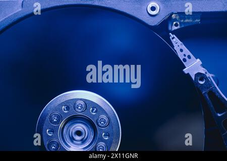 closeup top view of computer hard disc drive without cover. toned blue image. Stock Photo