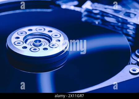 hard disk without top cover. computer hardware part. selective focus. Stock Photo