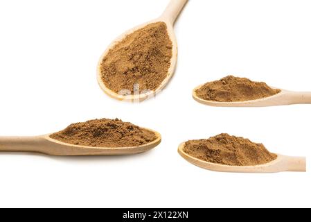 Mix spices on wooden spoon isolated on white background. Stock Photo