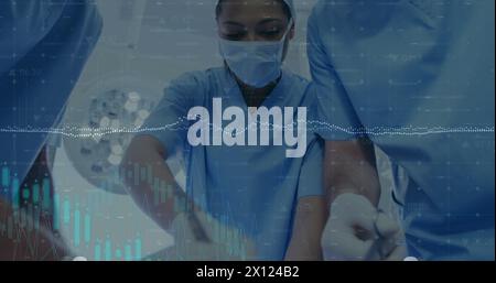 Image of rotating dna over caucasian female anesthesiologist using smartphone Stock Photo