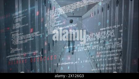 Image of data processing over caucasian man in server room Stock Photo