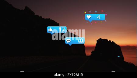 Image of social media icons over sunset and sea landscape Stock Photo