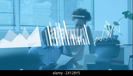 Image of graphs, loading bars and map over diverse coworkers discussing reports in office Stock Photo