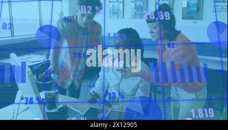 Image of changing numbers and graphs over diverse coworkers discussing reports on computer Stock Photo