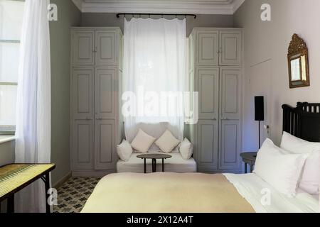 Modern classic bedroom in Mimi Calpe, 1950s French luxury villa and hotel in Tangier, Morocco Stock Photo