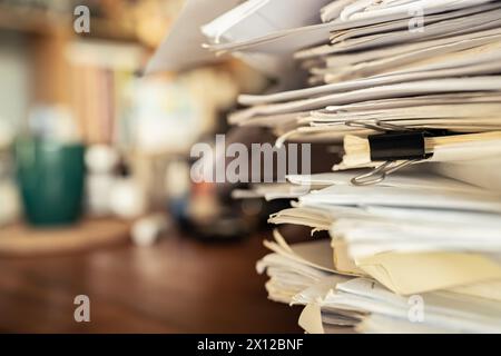 A pile of papers on working table Stock Photo