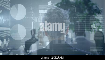 Image of financial data over back of diverse businesspeople walking Stock Photo