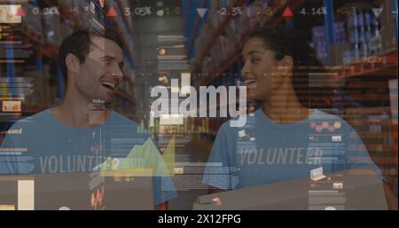 Image of data processing over diverse group of warehouse workers Stock Photo