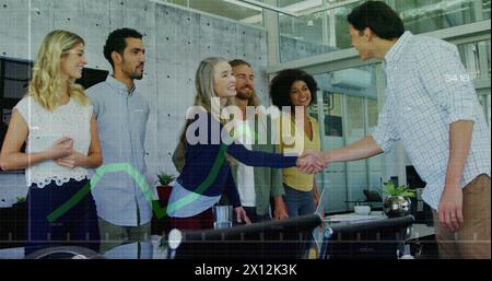 The executives are greeting their colleagues in the office Stock Photo