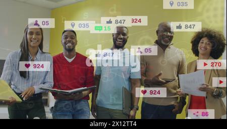 Image of notification bars over diverse coworkers discussing and smiling while looking at camera Stock Photo