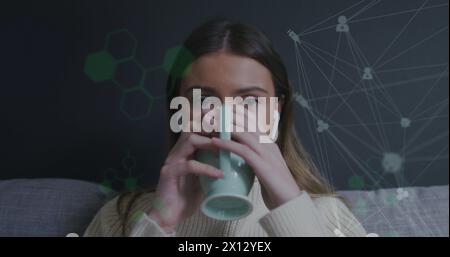 Image of data processing over caucasian woman smiling Stock Photo